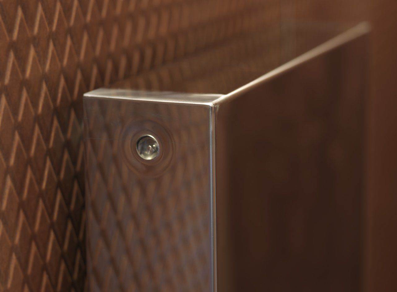 Close-up of Supermirror stainless steel electric radiator